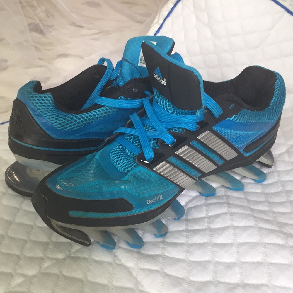 A size 4 Adidas Springblade tennis shoes